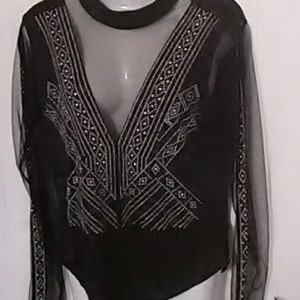 Body blouse snap between the leg